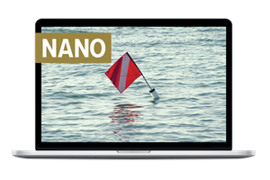 Image of Laptop Computer with Red Flag coming out of water on Screen