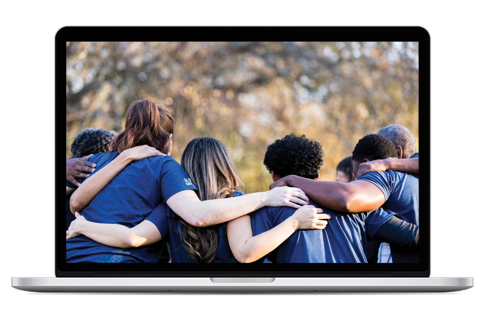 Laptop displaying an image of a group of people holding each other arm in arm