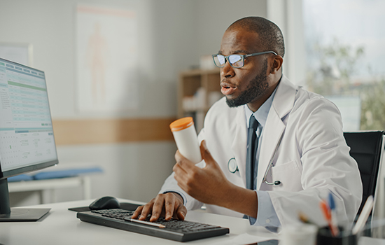 Doctor reviewing a prescription