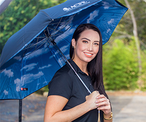 blue umbrella with clouds